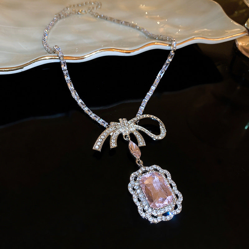 Unique design necklace featuring pink crystal pendant